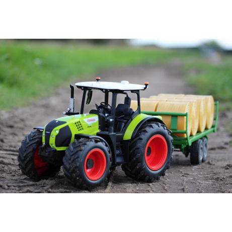 RC traktor ARION CLAAS 1/16 s valníkem s balíky slámy